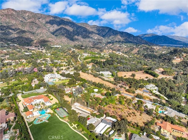 drone / aerial view featuring a mountain view