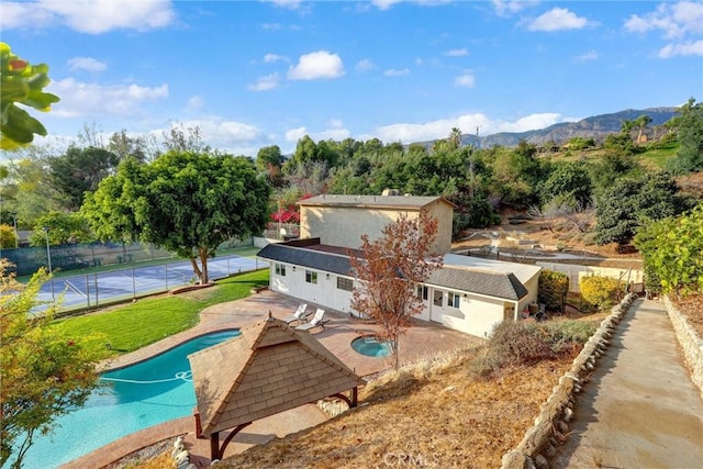 exterior space featuring a mountain view