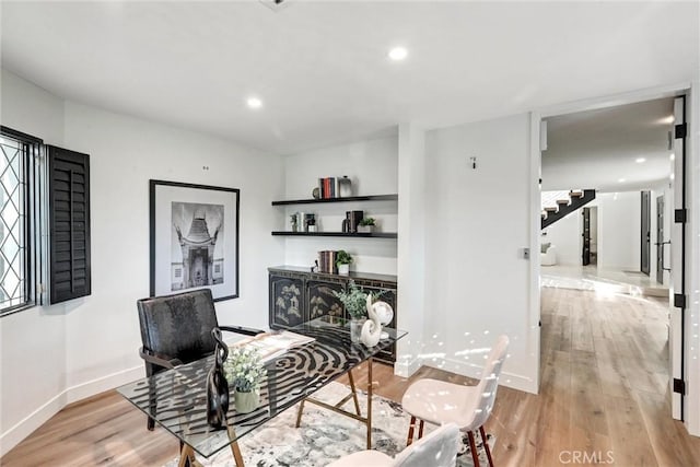 sitting room with light hardwood / wood-style floors