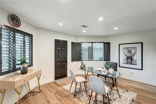 dining room featuring light hardwood / wood-style floors