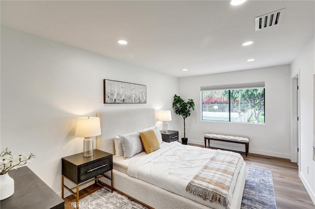 bedroom featuring wood-type flooring