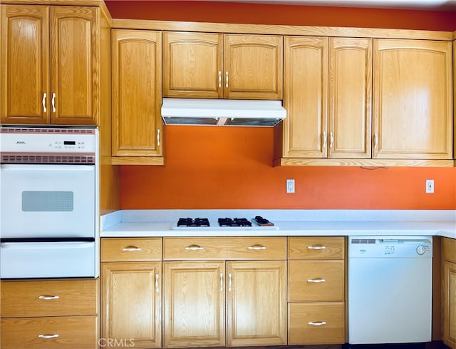 kitchen featuring white appliances