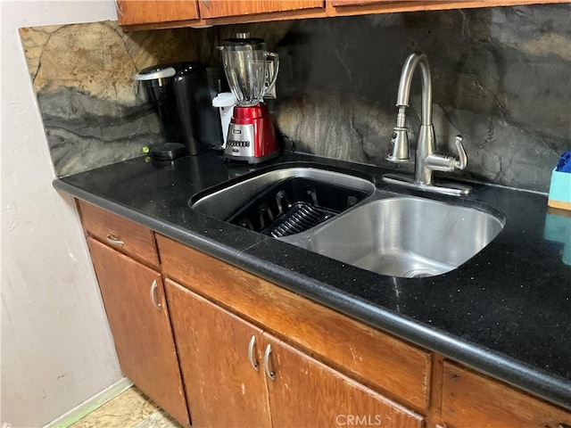 kitchen with decorative backsplash and sink