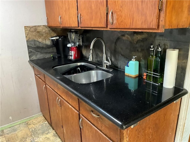 kitchen with decorative backsplash and sink