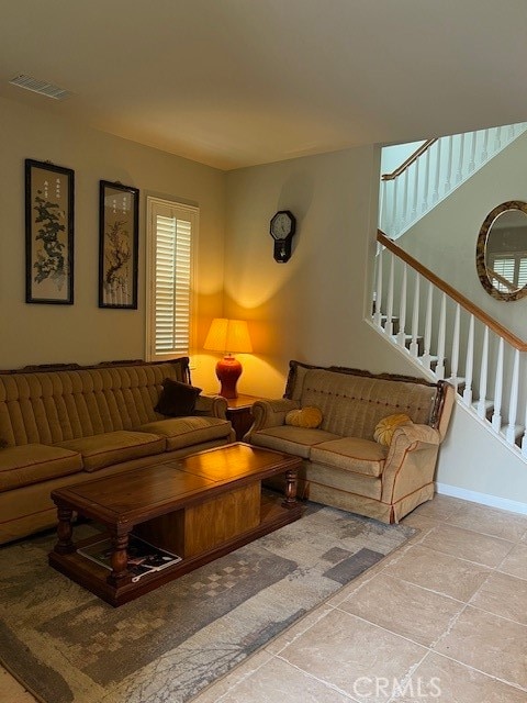 living room featuring light tile patterned floors