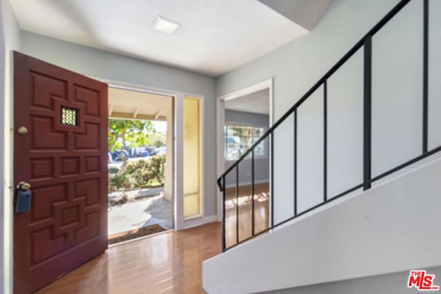 entryway with light hardwood / wood-style floors