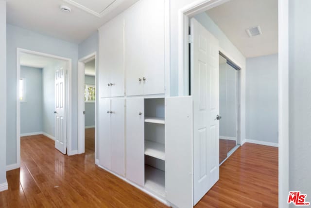 hall featuring hardwood / wood-style floors