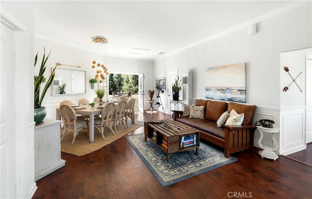 living room featuring crown molding and dark hardwood / wood-style floors