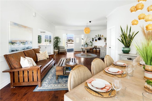 living room with hardwood / wood-style floors and ornamental molding