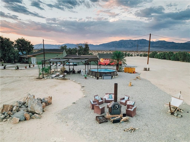 surrounding community featuring a mountain view