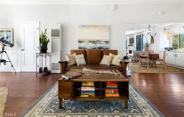 living room with dark hardwood / wood-style flooring