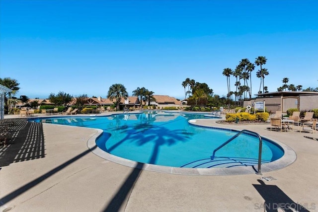 view of swimming pool featuring a patio