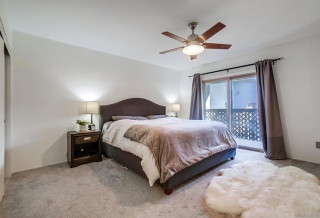 bedroom with ceiling fan, access to exterior, and light carpet