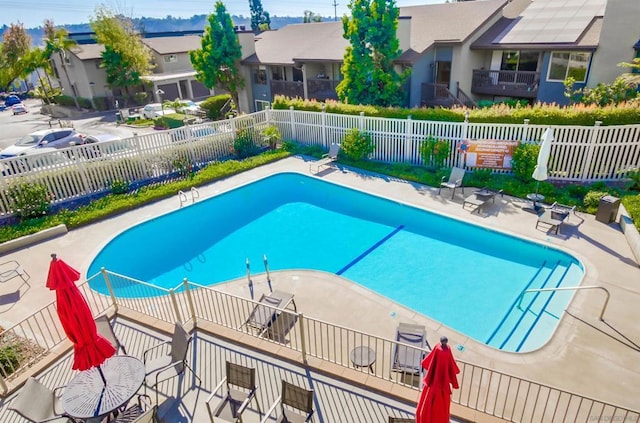 view of swimming pool featuring a patio