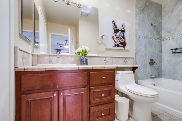 full bathroom with tile patterned floors, backsplash, vanity, and tiled shower / bath