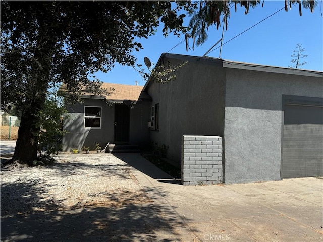 view of home's exterior featuring a garage