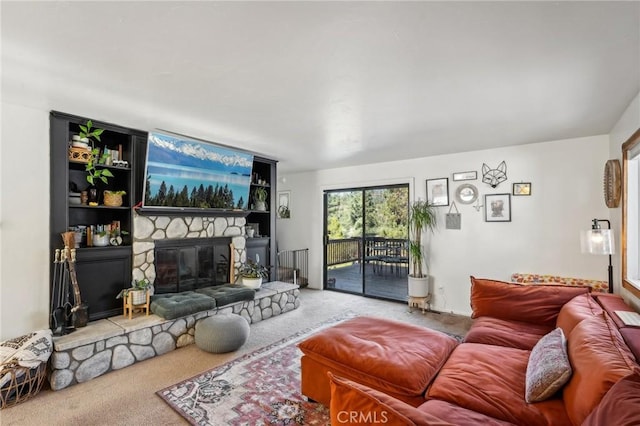 living room featuring a stone fireplace and carpet floors