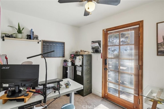 office with ceiling fan and light colored carpet