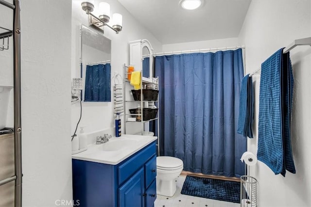 full bathroom with vanity, toilet, and shower / tub combo with curtain