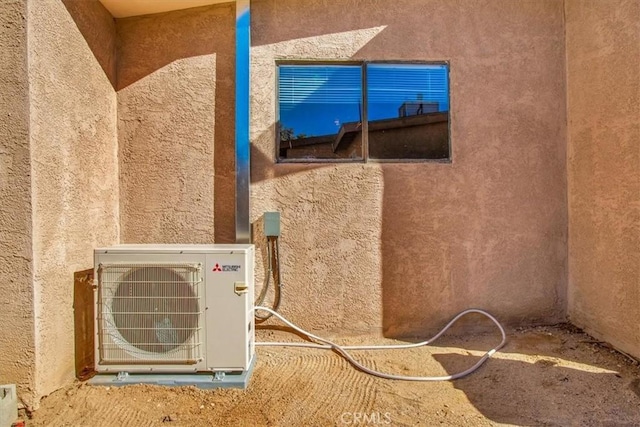 exterior space featuring ac unit