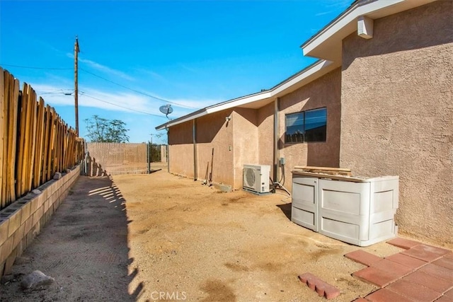 view of home's exterior featuring ac unit