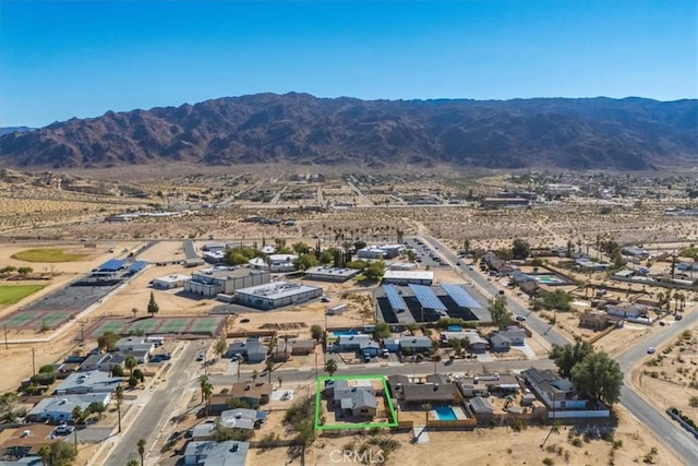 drone / aerial view featuring a mountain view