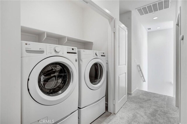 15974 Jamie Ln Unit 1, Fontana, CA 92336 - laundry room featuring washer and dryer and light carpet
