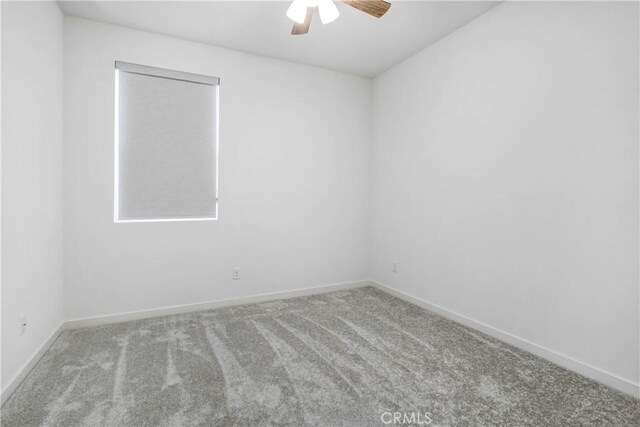 15974 Jamie Ln Unit 1, Fontana, CA 92336 - spare room with carpet floors, a ceiling fan, and baseboards