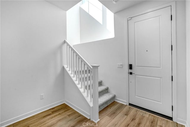15974 Jamie Ln Unit 1, Fontana, CA 92336 - stairs with wood finished floors and baseboards