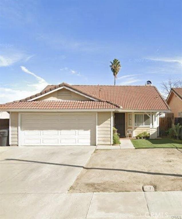 ranch-style home with a garage