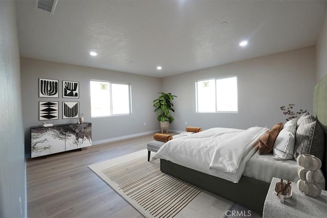 bedroom featuring light hardwood / wood-style flooring