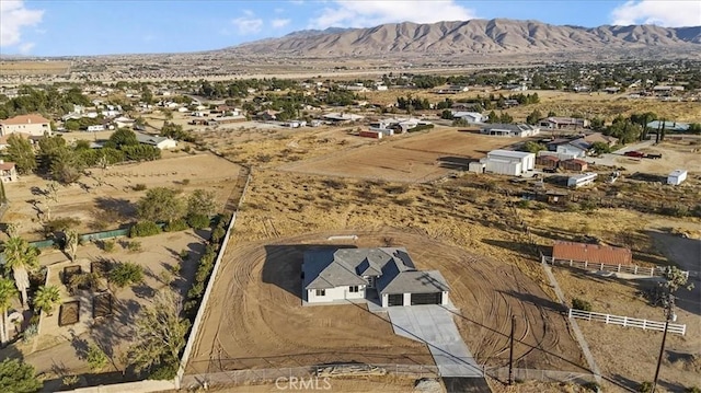 drone / aerial view featuring a mountain view