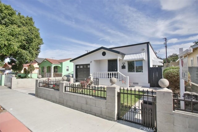 bungalow-style home with a garage