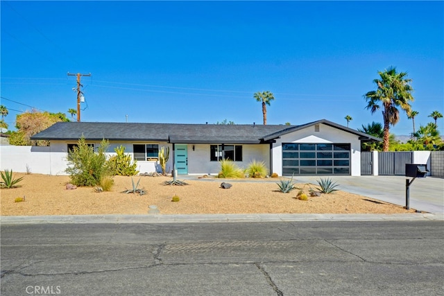 single story home featuring a garage