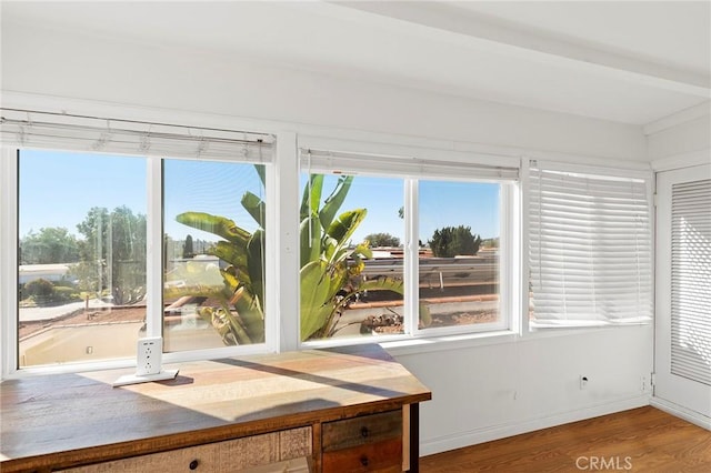 unfurnished sunroom featuring a healthy amount of sunlight