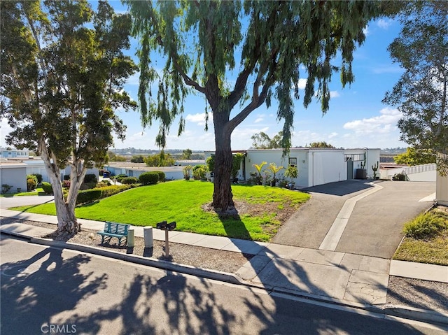 view of front of home with a front yard