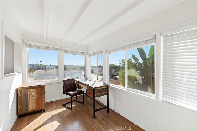 sunroom with beamed ceiling