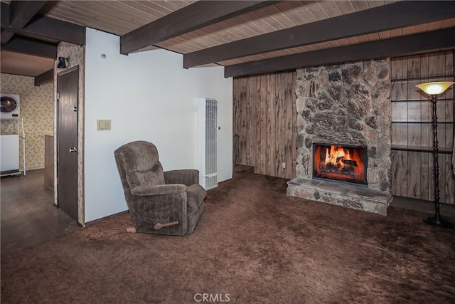 interior space with wooden walls and a fireplace