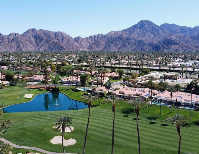 view of property's community featuring a water and mountain view