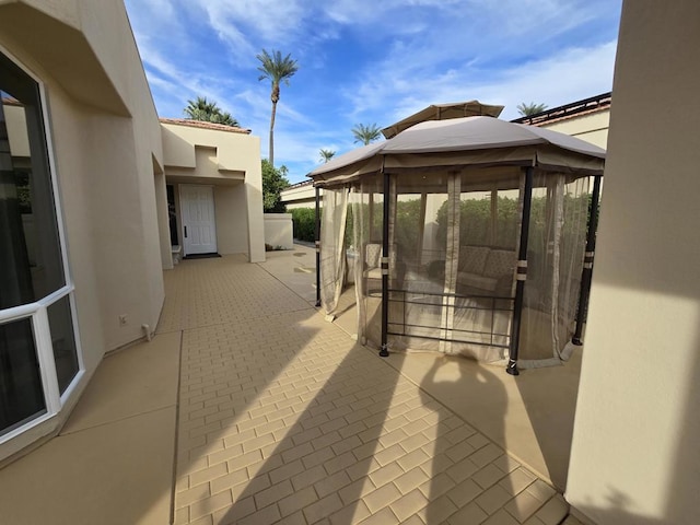 view of patio featuring a gazebo