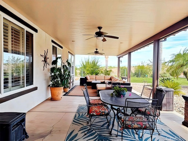 view of patio featuring outdoor lounge area and ceiling fan