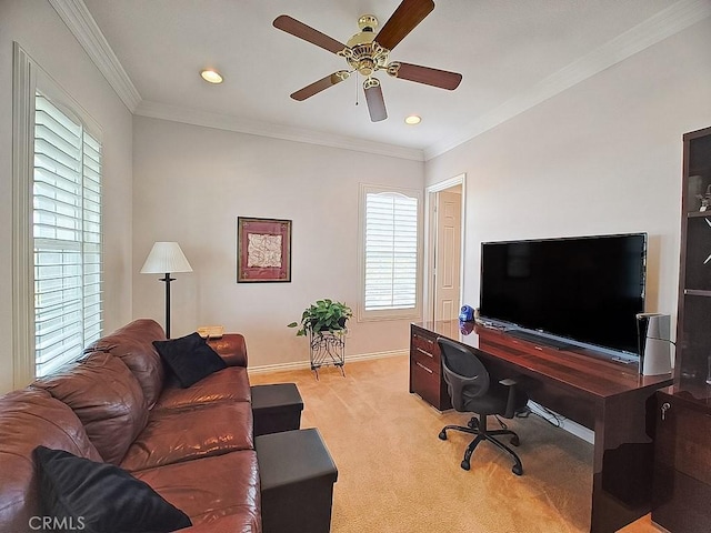 carpeted office space with ceiling fan, crown molding, and a wealth of natural light