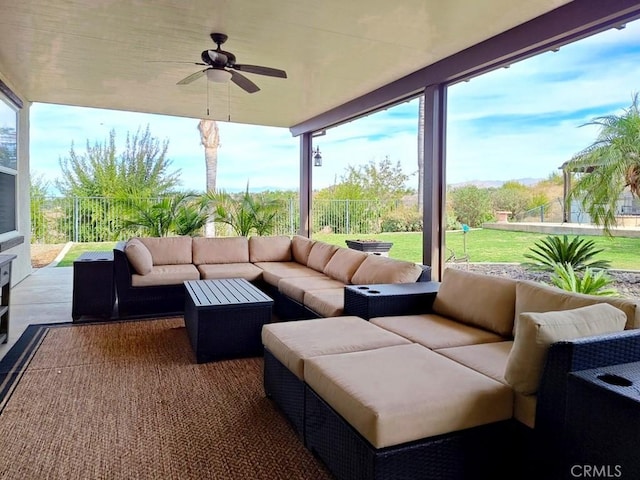 view of patio featuring outdoor lounge area and ceiling fan