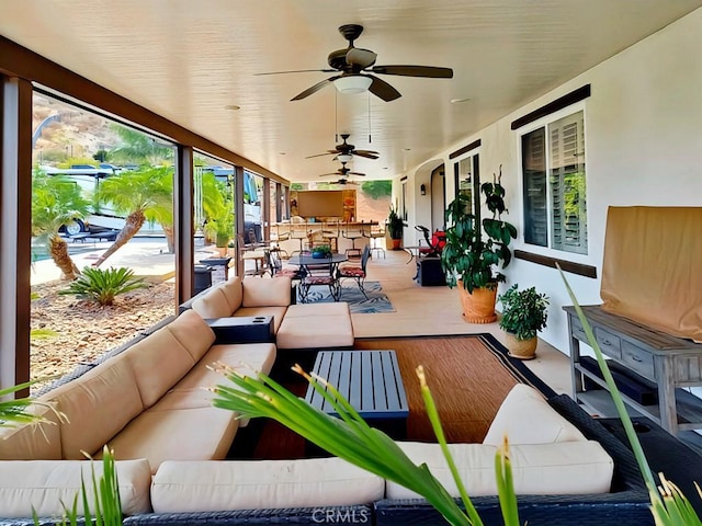 view of patio / terrace with outdoor lounge area and ceiling fan