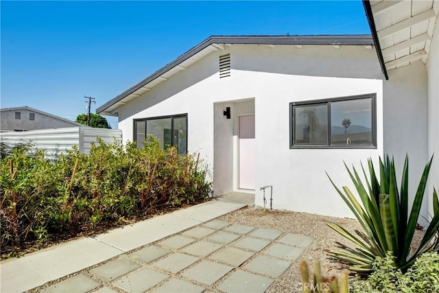 rear view of house with a patio