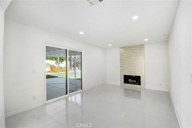 unfurnished living room featuring a fireplace