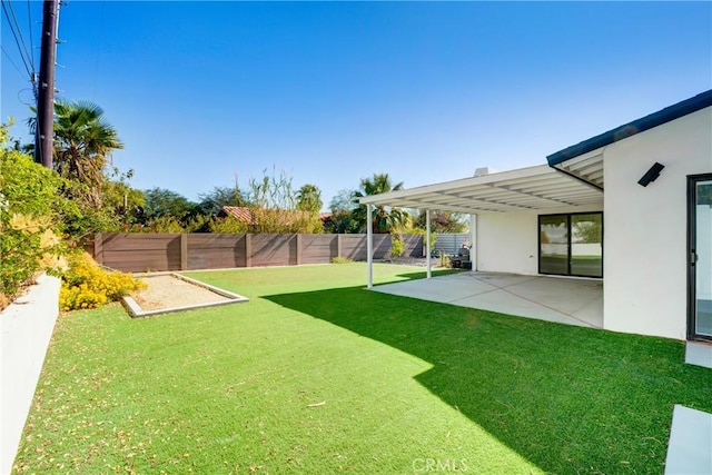 view of yard featuring a patio