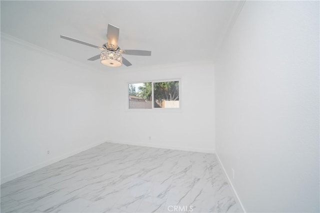 empty room with ceiling fan and crown molding