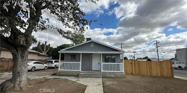 bungalow-style home with covered porch