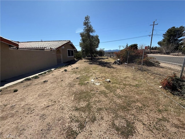 view of yard featuring fence